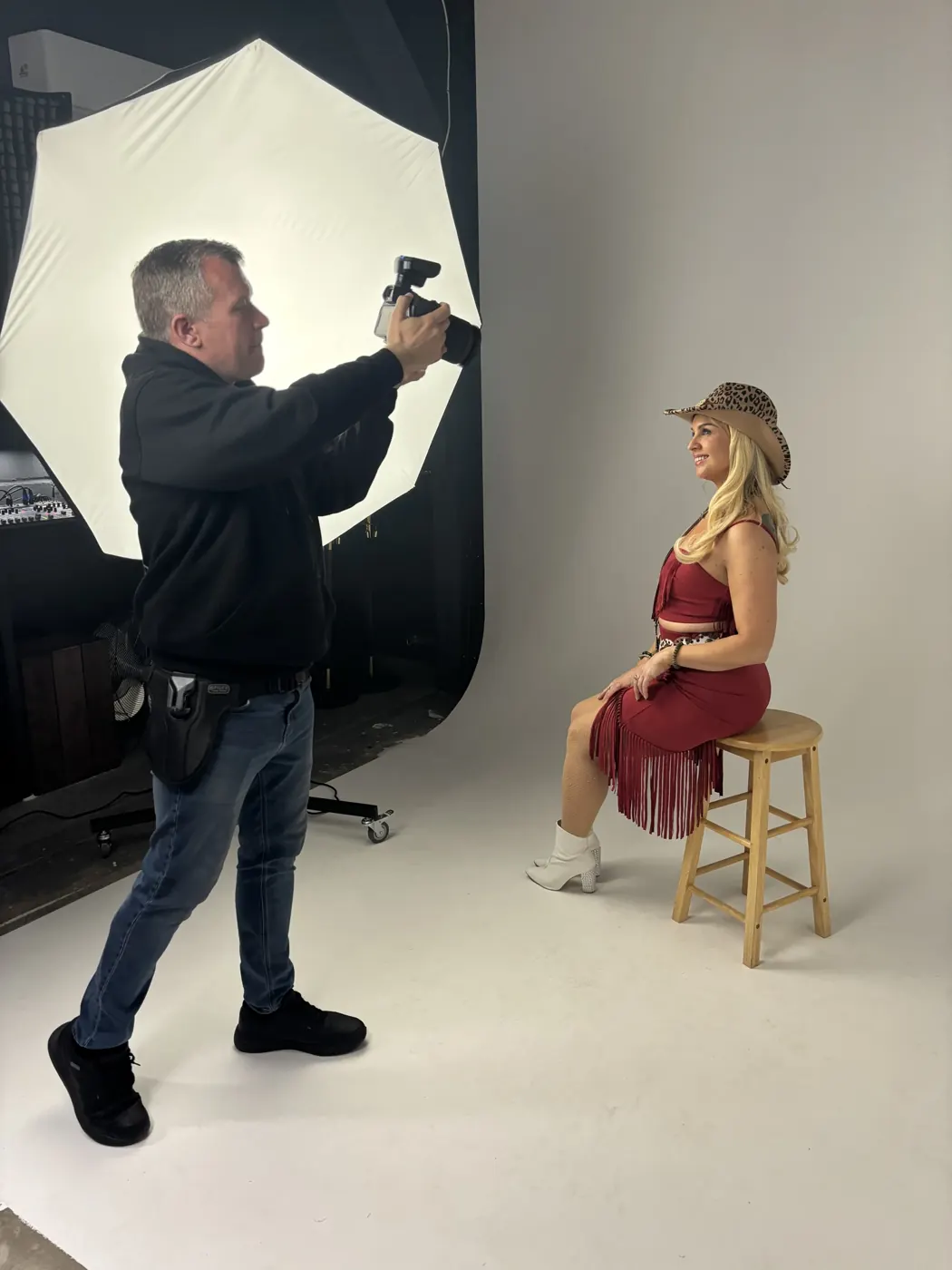 Artist photoshoot on the white studio backdrop with pro lighting