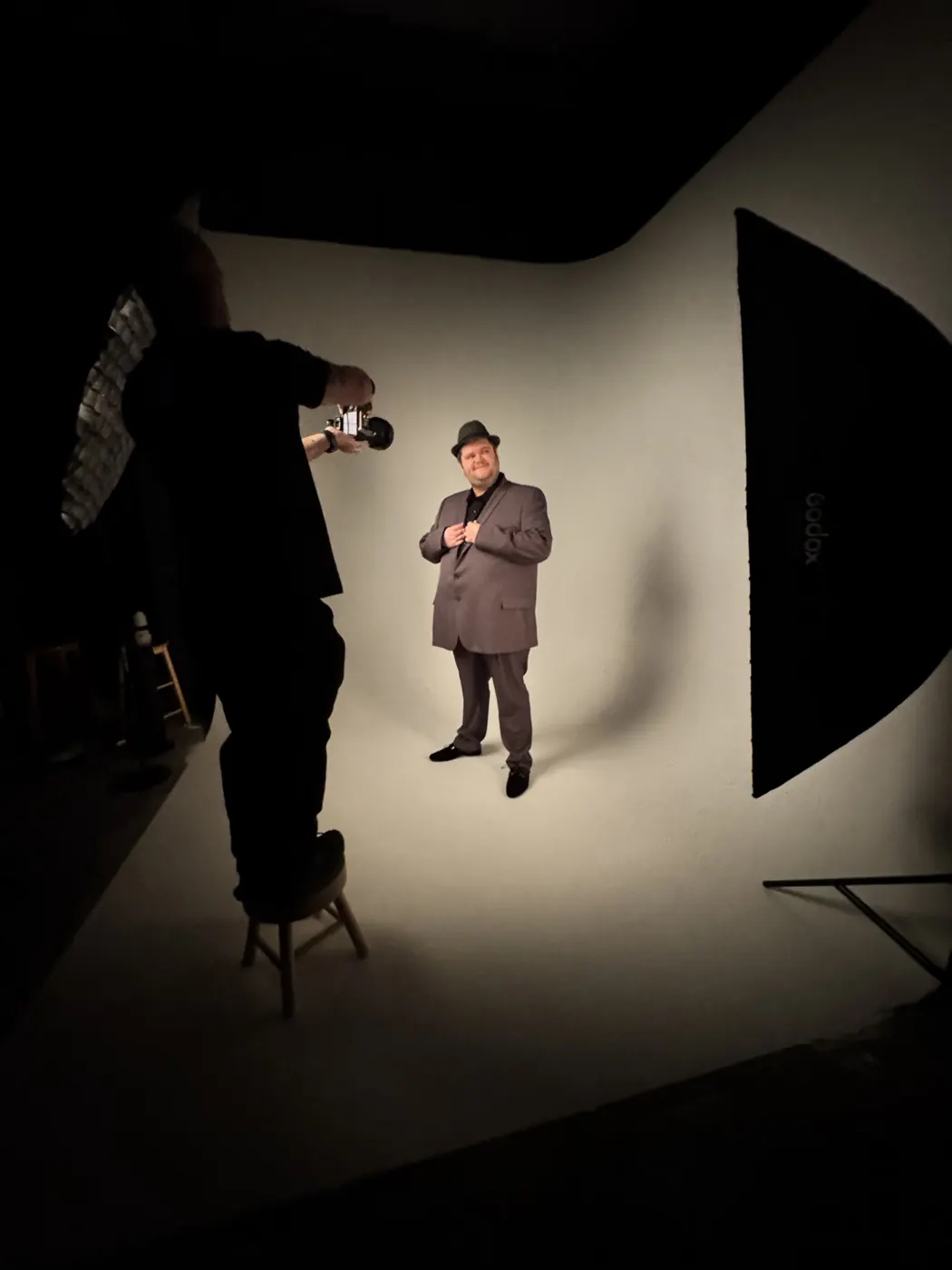 Dramatic single-light portrait session during a showreel photoshoot